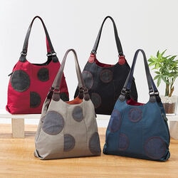 ドット柄マチが広がる手提げ